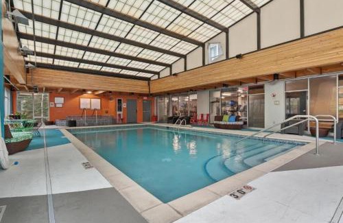Mill District Apartment | CozySuites Mill District with pool, gym #03
