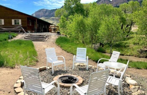 Cody Apartment | Creek Side Cabin #2- Wapiti Valley, steps from Trout Creek