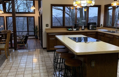 Conneaut House | Creek side retreat and breathtaking views! Moments from hunting and fishing!