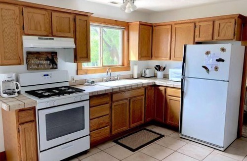 Cody Apartment | Creekside Cabin #3- Wapiti Valley, steps from Trout Creek