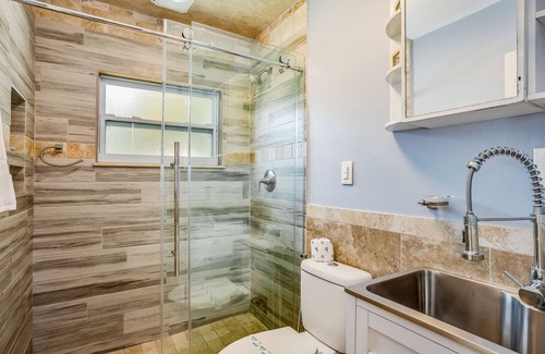 Fort Myers House | Creekside retreat with screened pool, patio, grill, firepit, canoe + kayak, & AC