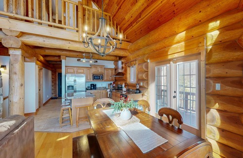 Mineral House | Custom lakefront home with lake views, hot tub, firepit, fireplace, dock, & deck