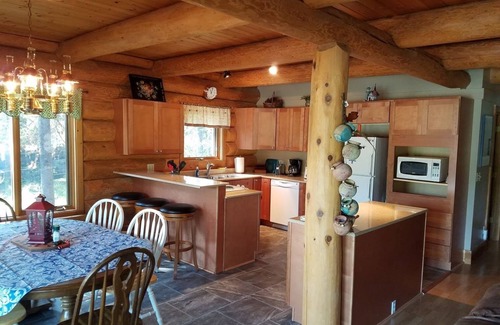 Columbia Falls Cabin | Custom Log Home bordering Glacier Park and North Fork River!