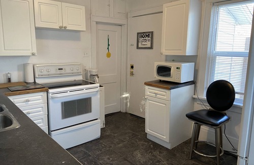 Regina House | Cute comfortable home close to Stadiums, Hospital, RCMP depot.