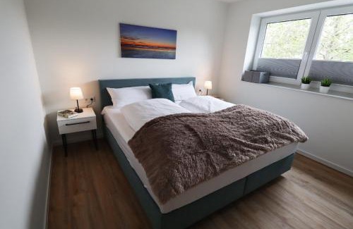 Tossens Apartment | Dünenzauber - Neues Apartment mit Sauna in Strandnähe
