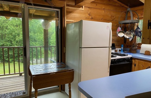 Clarksville House | "Dam Right" Off-Grid/Solar powered Log Cabin with DIRECT Trail Access