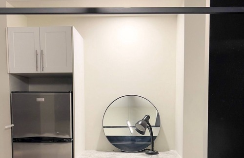 Downtown Winnipeg Apartment | Dark themed minimalist apart at the heart of downtown Winnipeg .