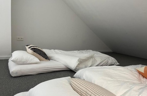 Hohwacht Apartment | De ole School - großzügiges Loft mit Kamin (Apt. 23)