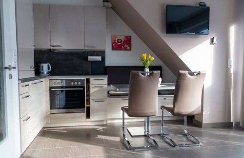 Dorumer Neufeld Apartment | Bright modern family-friendly apartment near the beach with dog