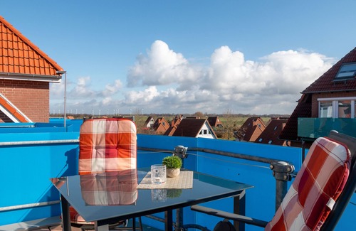 Dorumer Neufeld Apartment | Bright modern family-friendly apartment near the beach with dog