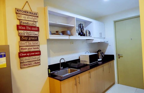 Silang Junction North Apartment | Deluxe Family Room in Tagaytay With Taal Lake View