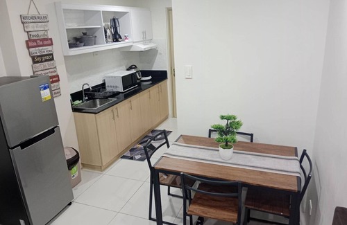 Silang Junction North Apartment | Deluxe Family Room in Tagaytay With Taal Lake View