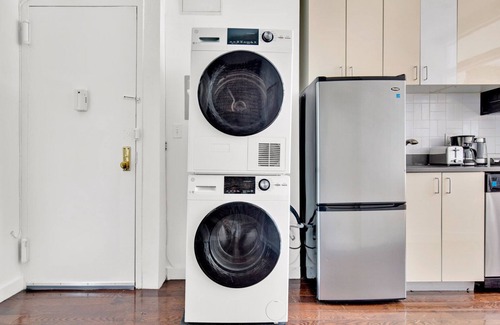Chinatown Apartment | Deluxe LES 1BR w/W/D, steps to B/D Train & Park, by Blueground