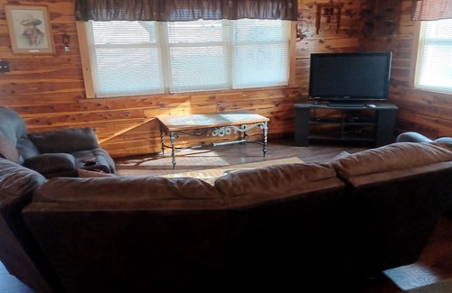 Fittstown House | Deluxe log home with 57 acres on 1/2 mile of the SO. Canadian river. Sleeps 6.
