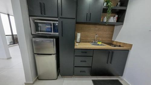 Puerta de Tierra Apartment | Deluxe Ocean View Studio with Free Parking & Pool