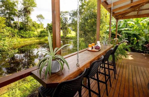 Doonan House | Deluxe Suite with Fireplace & Pond, Noosa Hinterland