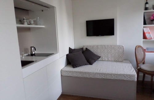 Sant' Ambrogio Apartment | Deluxe suite with great view! Bed and view in the heart of Florence.
