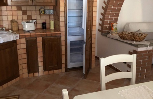 Laureana Cilento House | Description