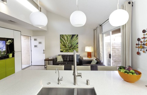 Uptown Design District Condo | Designer Condo With Wrap Around Patio Located in the Famous Movie Colony