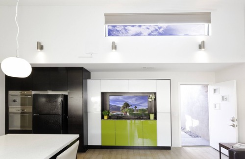 Uptown Design District Condo | Designer Condo With Wrap Around Patio Located in the Famous Movie Colony
