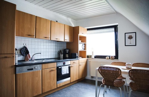 Michelbach Apartment | DG-Wohnung mit sonnigem Balkon