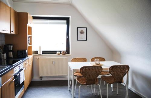 Michelbach Apartment | DG-Wohnung mit sonnigem Balkon