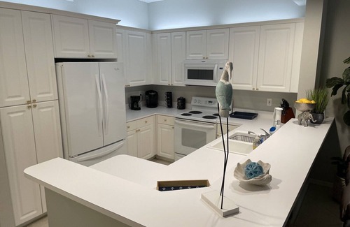 Pelican Bay Condo | Directly across Ritz Carlton Naples Beach Resort!