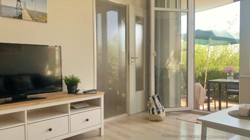 Wurster Nordseekuste Apartment | Direkt am Deich! Ferienwohnung de Prigg