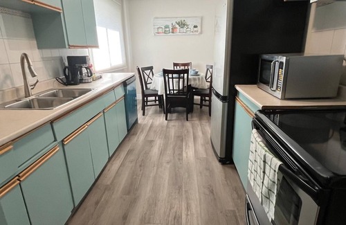Northwest Edmonton House | Discover comfort with your family at this peaceful place to stay close to WEM.