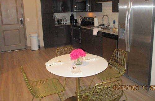 Atlantic Station Area Condo | Discover the best of Atlanta with views overlooking the Midtown area.
