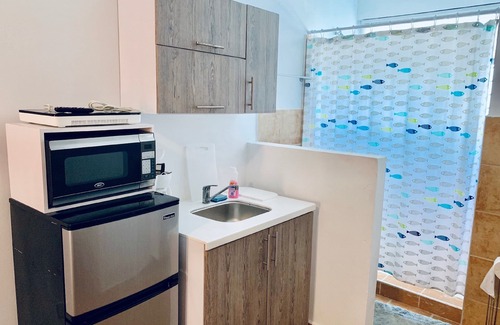 Islote Apartment | Discovery Inn Suites at 681 Ocean Drive