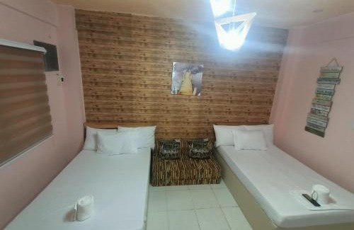 Cabanatuan Apartment | DJCI Apartelle Walk to Robinson & NE Pacific Mall 3 Min to SM Cabanatuan