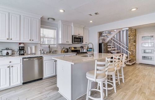 Runaway Bay House | Dock & Fire Pit: Riverfront Runaway Bay Retreat