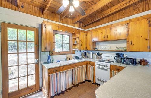 Eclectic Cabin | Dock + Stunning Views: Forested Lake Martin Cabin!