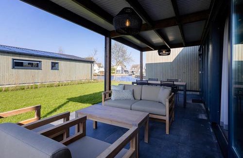Delfstrahuizen House | Docklodge at Frisian Lakes with Private Mooring