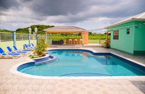Saint Peter Parish Apartment | Docs Paradise.A unique blend of privacy, comfort, and a touch of tropical charm.