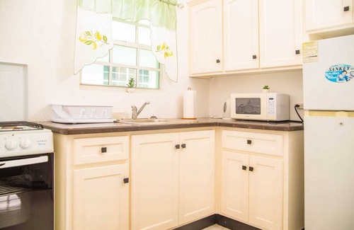 Buckleys Village Apartment | Docs Paradise Yellow Apartment