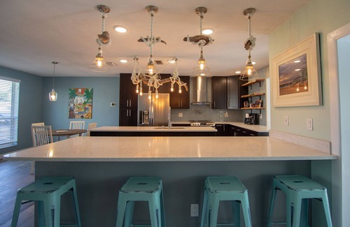 Indian Harbour Beach House | DOG Friendly BEACHSIDE 4BR/3BA, Solar/Saltwater Pool, No Smoke +Special Offers