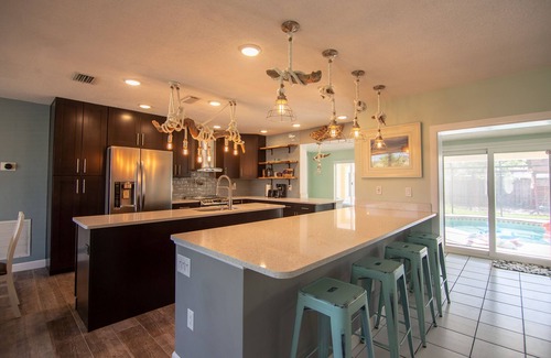 Indian Harbour Beach House | DOG Friendly BEACHSIDE 4BR/3BA, Solar/Saltwater Pool, No Smoke +Special Offers