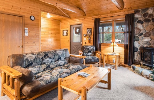 New Lisbon Cabin | Dog-friendly cabin with gas fireplace, firepit, porch, & shared pond access