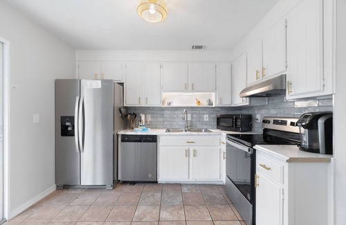 Gulf Breeze House | Dog-friendly coastal home with enclosed yard, firepit, grill, covered patio, AC