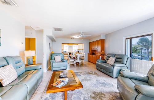 Lower Matecumbe Beach House | Dog-friendly escape with private dock, porch, balcony, water view, & central AC