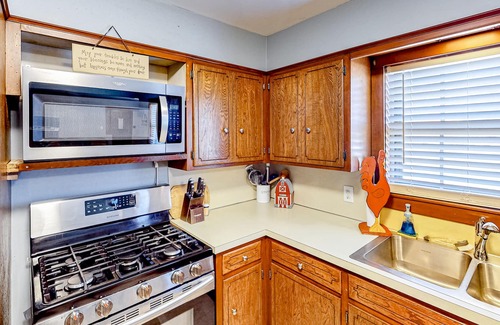 Tower Heights House | Dog-friendly home with large yard, grill, & basketball hoop