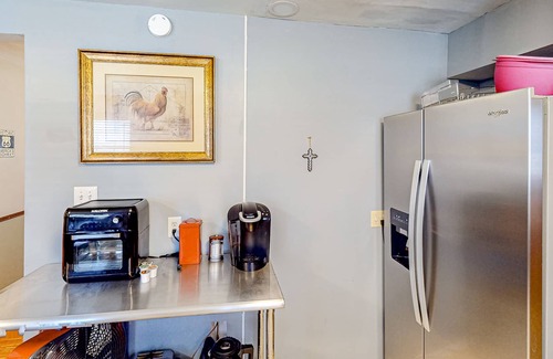 Tower Heights House | Dog-friendly home with large yard, grill, & basketball hoop