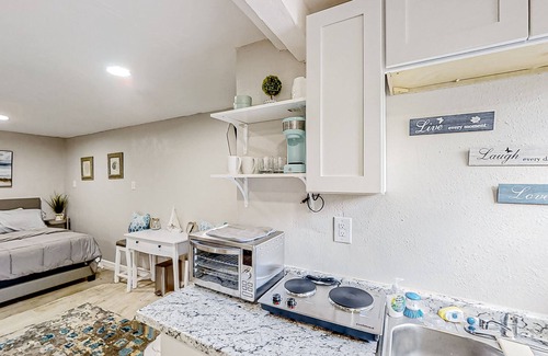 Bearss Plaza Apartment | Dog-friendly, lakeview retreat with kitchenette, yard, & electric grill