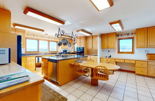 Glenwood Springs Cabin | Dog-friendly, mountain view lodge with a game room, fireplace, large deck, & W/D