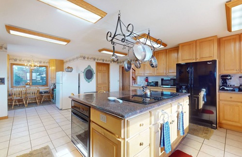 Glenwood Springs Cabin | Dog-friendly, mountain view lodge with a game room, fireplace, large deck, & W/D