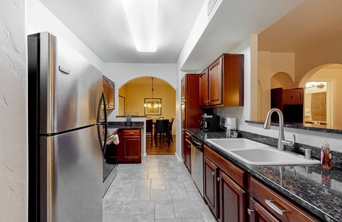 Tucson Condo | Dog-friendly mountain view condo with pool, gym, grill, fireplace, & sunroom