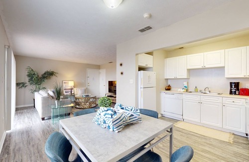 River Pointe Apartment | Dog-Friendly Riverfront Condo w/a Shared Pool, Sports Courts, Gym, & Fast WiFi
