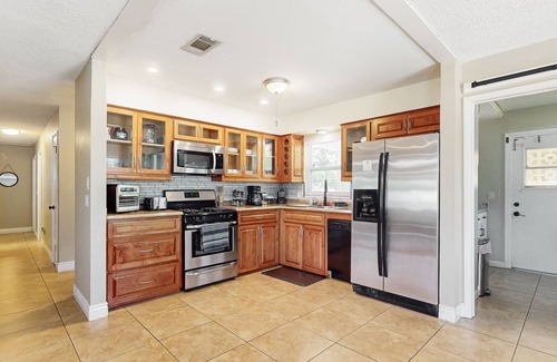 College Green Estates House | Dog-friendly updated home with enclosed yard, smart TVs, firepit, grill, & games